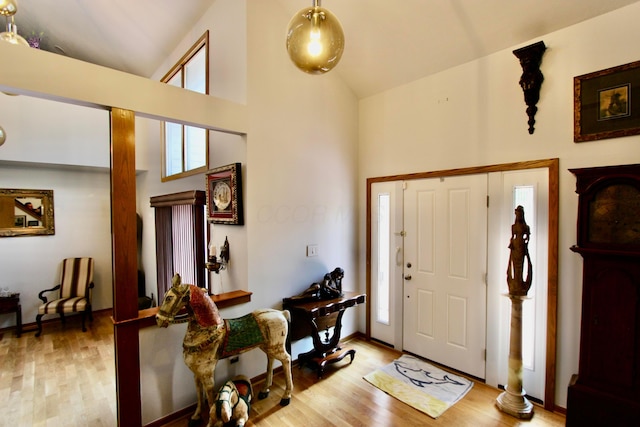 8292 Breckenridge Way, Columbus, OH 43235 - entryway with light wood-style flooring and high vaulted ceiling