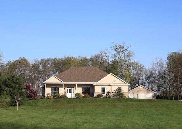 ranch-style house with a front yard, stucco siding, and a garage
