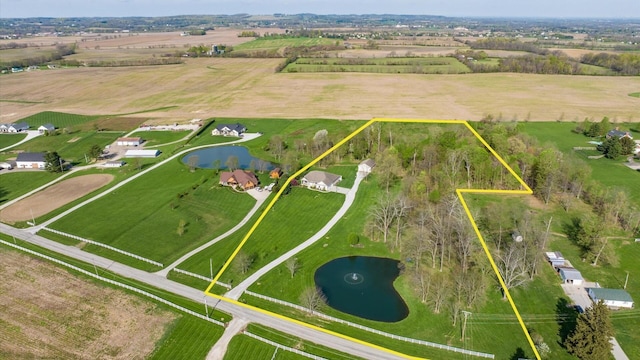 overview of rural landscape with a nearby body of water and property boundaries highlighted