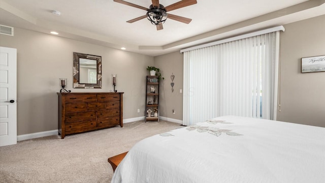 bedroom featuring light carpet, recessed lighting, baseboards, multiple windows, and a ceiling fan