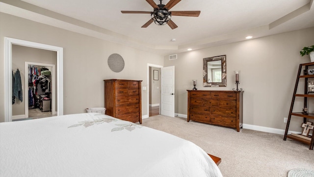 4225 Election House Rd NW, Lancaster, OH 43130 - bedroom with recessed lighting, light carpet, a spacious closet, a ceiling fan, and a tray ceiling