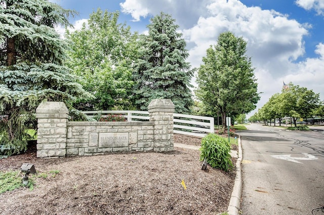 view of gate featuring fence