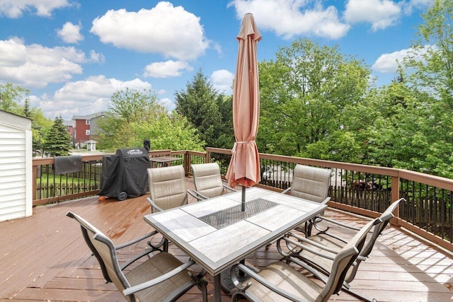 3102 Menzola Dr, Columbus, OH 43228 - wooden terrace featuring outdoor dining area and grilling area