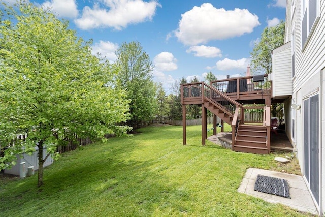 3102 Menzola Dr, Columbus, OH 43228 - view of yard featuring stairs and a wooden deck
