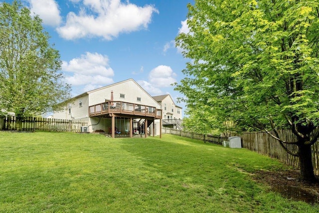 3102 Menzola Dr, Columbus, OH 43228 - view of yard with a deck and stairs