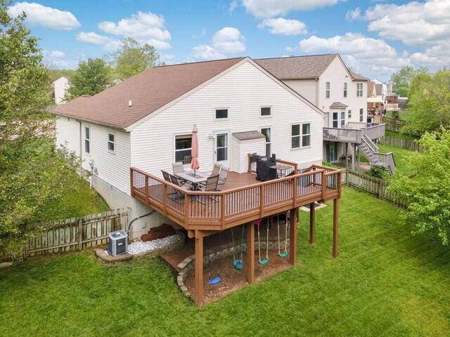 3102 Menzola Dr, Columbus, OH 43228 - rear view of property with a deck, central AC unit, and a shingled roof