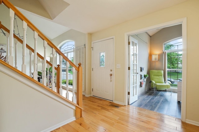 3998 Kul Cir S, Hilliard, OH 43026 - foyer featuring a wealth of natural light, visible vents, stairs, and hardwood / wood-style flooring