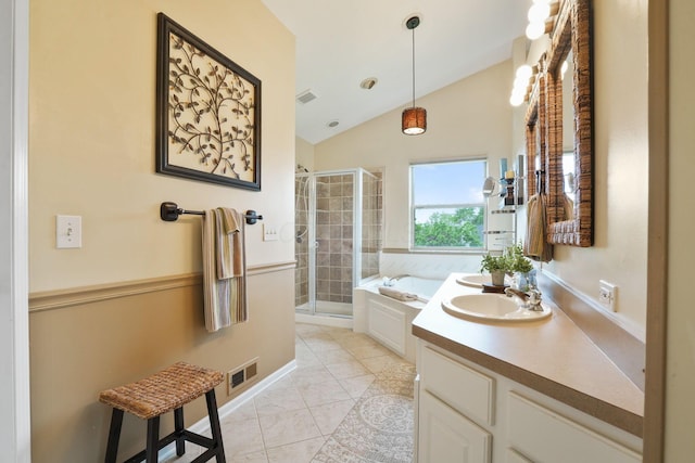 3998 Kul Cir S, Hilliard, OH 43026 - bathroom with a bath, visible vents, a shower stall, vaulted ceiling, and vanity