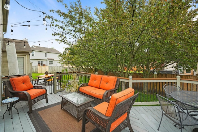 3998 Kul Cir S, Hilliard, OH 43026 - wooden deck with a fenced backyard, outdoor dining area, and an outdoor living space
