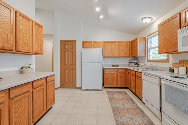 5933 Katara Dr, Galloway, OH 43119 - kitchen featuring white appliances, a sink, lofted ceiling, light countertops, and light flooring