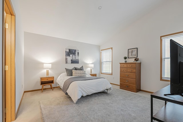 5933 Katara Dr, Galloway, OH 43119 - bedroom with light carpet, lofted ceiling, and baseboards