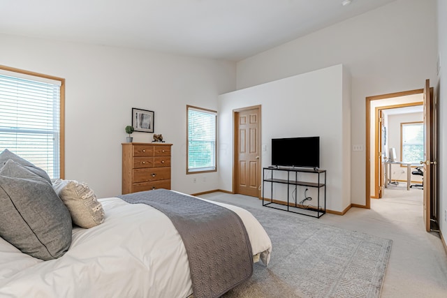 5933 Katara Dr, Galloway, OH 43119 - bedroom with light carpet, baseboards, and lofted ceiling