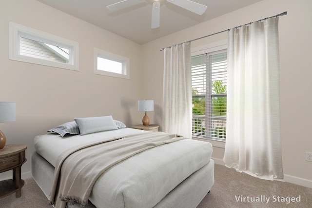 7678 Gateway Blvd, Powell, OH 43065 - carpeted bedroom with a ceiling fan and baseboards