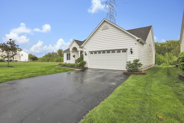 4650 Commons Park Dr, New Albany, OH 43054 - single story home with asphalt driveway, an attached garage, and a front yard