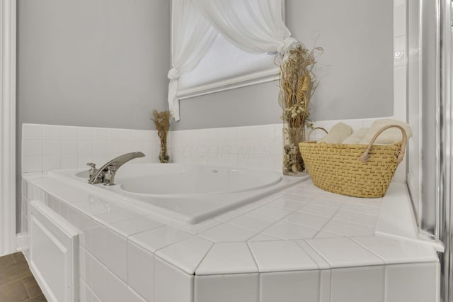 4650 Commons Park Dr, New Albany, OH 43054 - bathroom featuring a bath and tile patterned flooring
