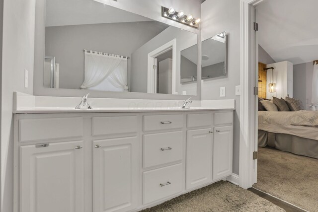 4650 Commons Park Dr, New Albany, OH 43054 - bathroom with lofted ceiling, ensuite bathroom, and double vanity