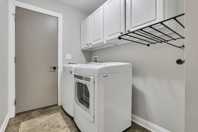 4650 Commons Park Dr, New Albany, OH 43054 - washroom featuring cabinet space, separate washer and dryer, baseboards, and stone finish floors