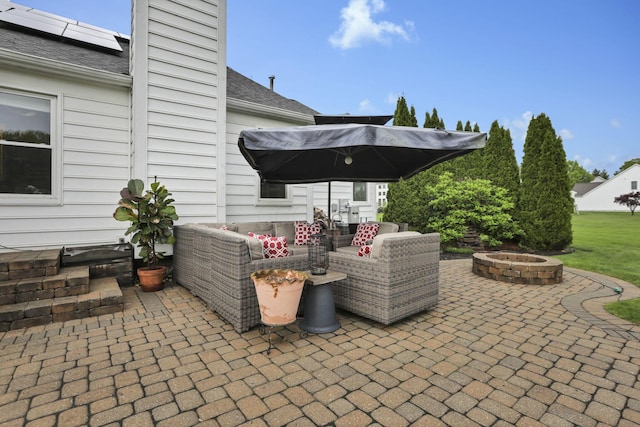 4650 Commons Park Dr, New Albany, OH 43054 - view of patio / terrace with an outdoor living space with a fire pit