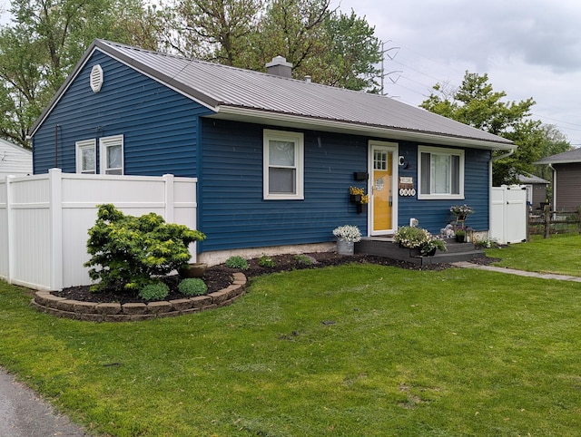 5349 Norwich St, Hilliard, OH 43026 - view of front facade with metal roof and a chimney