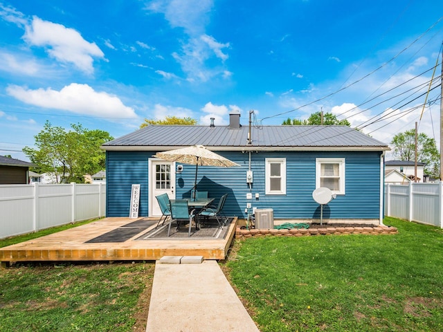 5349 Norwich St, Hilliard, OH 43026 - rear view of property with a deck, metal roof, and central air condition unit