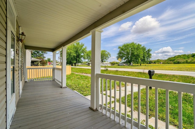 wooden terrace with covered porch