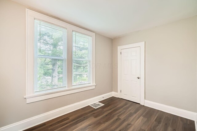 96 S Eureka Ave, Columbus, OH 43204 - empty room featuring dark wood-style floors and baseboards