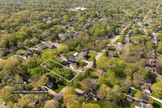 birds eye view of property with a residential view