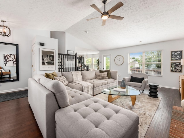 2284 Brisum Way, Hilliard, OH 43026 - living area with a textured ceiling, dark wood finished floors, ceiling fan, baseboards, and stairs