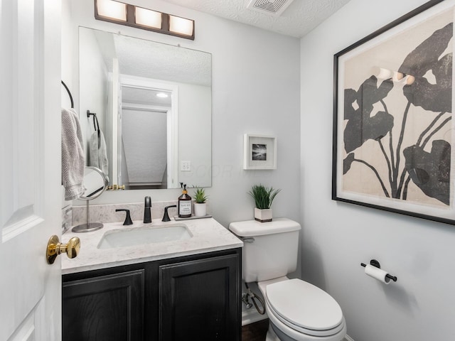 2284 Brisum Way, Hilliard, OH 43026 - bathroom featuring toilet, a textured ceiling, and vanity