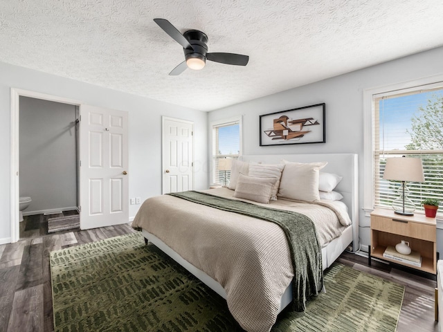 2284 Brisum Way, Hilliard, OH 43026 - bedroom with wood finished floors, a textured ceiling, ceiling fan, baseboards, and a closet