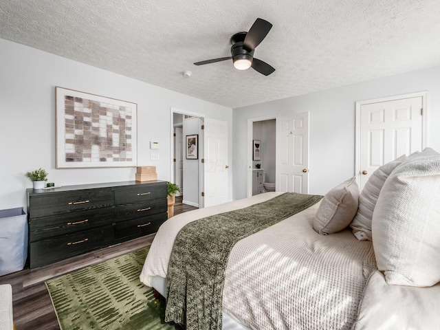 2284 Brisum Way, Hilliard, OH 43026 - bedroom featuring wood finished floors, a textured ceiling, and ceiling fan