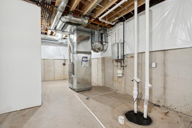 unfinished below grade area with water heater and heating unit