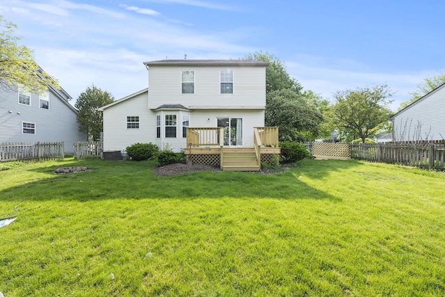 1301 Della Pl, Columbus, OH 43228 - rear view of property featuring a wooden deck and an outdoor fire pit