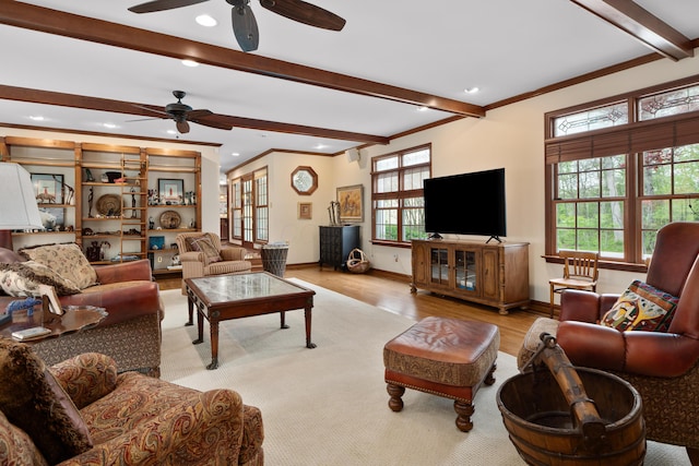 7870 Cook Rd, Plain City, OH 43064 - living room featuring a ceiling fan, beamed ceiling, crown molding, wood finished floors, and baseboards