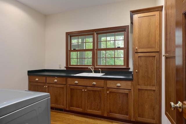 7870 Cook Rd, Plain City, OH 43064 - clothes washing area featuring cabinet space and light wood-style flooring