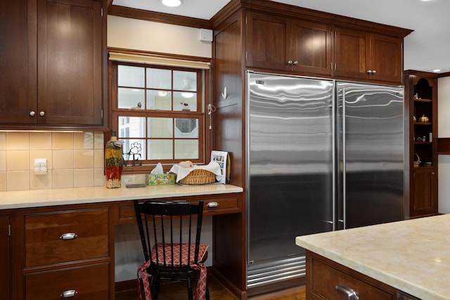 7870 Cook Rd, Plain City, OH 43064 - kitchen featuring built in refrigerator, light countertops, backsplash, dark brown cabinets, and recessed lighting