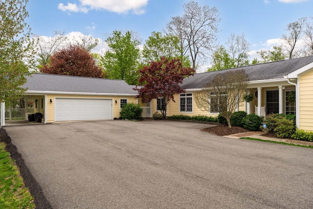 7870 Cook Rd, Plain City, OH 43064 - single story home featuring a garage and asphalt driveway