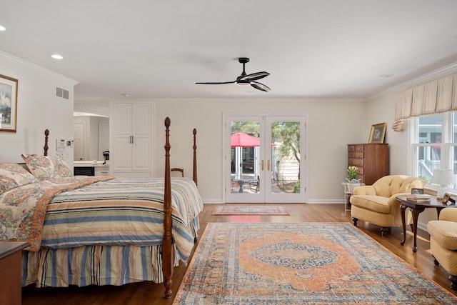 7870 Cook Rd, Plain City, OH 43064 - bedroom with access to outside, french doors, multiple windows, wood finished floors, and ornamental molding