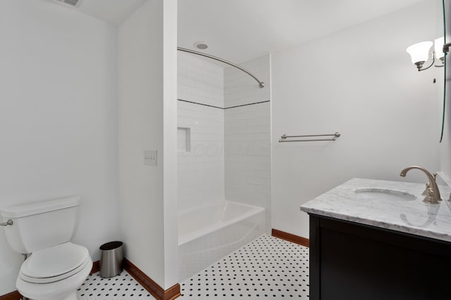 7870 Cook Rd, Plain City, OH 43064 - bathroom featuring baseboards, toilet, vanity, and bathtub / shower combination