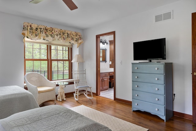 7870 Cook Rd, Plain City, OH 43064 - bedroom featuring dark wood-style flooring, baseboards, and ensuite bathroom