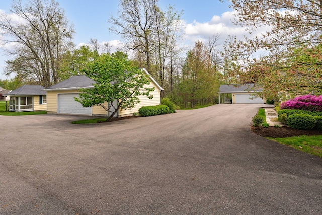 7870 Cook Rd, Plain City, OH 43064 - view of front of property featuring a garage