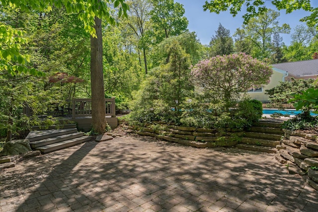 7870 Cook Rd, Plain City, OH 43064 - view of community featuring a patio area and a wooden deck