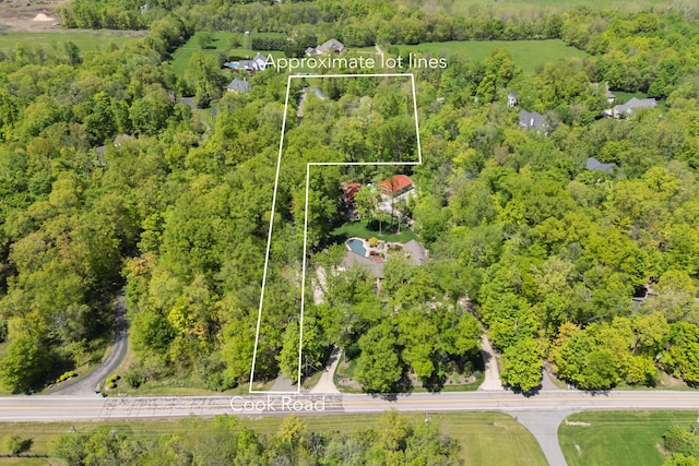 7870 Cook Rd, Plain City, OH 43064 - aerial overview of property's location with property parcel outlined and a heavily wooded area