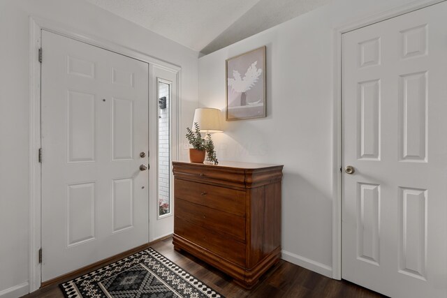 5372 Thistledown Dr, Columbus, OH 43221 - entrance foyer with baseboards, dark wood finished floors, and vaulted ceiling
