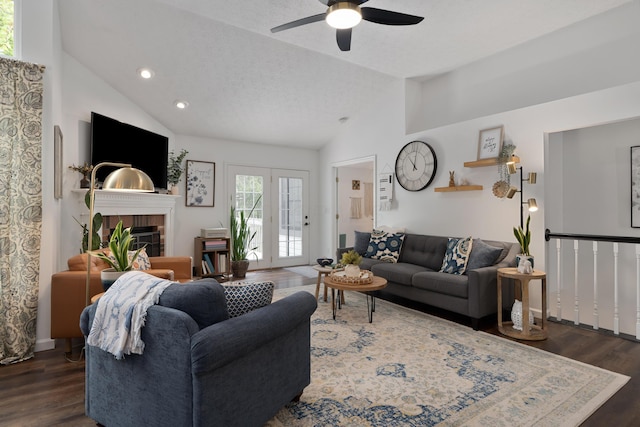 5372 Thistledown Dr, Columbus, OH 43221 - living room featuring wood finished floors, a ceiling fan, a fireplace, recessed lighting, and high vaulted ceiling