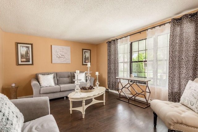 696 Brenton Pl, Columbus, OH 43213 - living room featuring baseboards, a textured ceiling, and wood finished floors