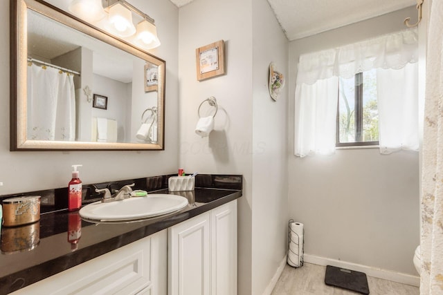 696 Brenton Pl, Columbus, OH 43213 - bathroom featuring vanity and baseboards