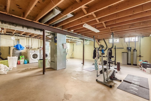 696 Brenton Pl, Columbus, OH 43213 - exercise area with washing machine and dryer and heating unit