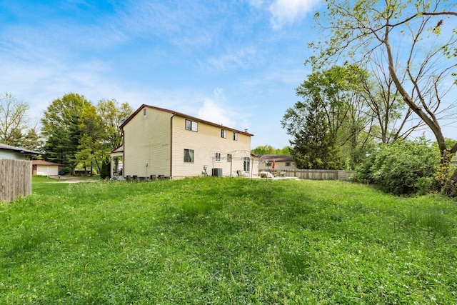 696 Brenton Pl, Columbus, OH 43213 - view of yard with central AC unit and fence