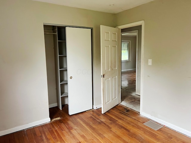 1794 Audrey Rd, Columbus, OH 43224 - unfurnished bedroom featuring baseboards, light wood-style floors, and a closet